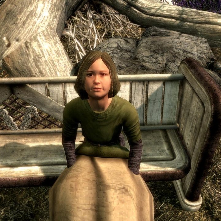Child sitting on a bench in Skyrim