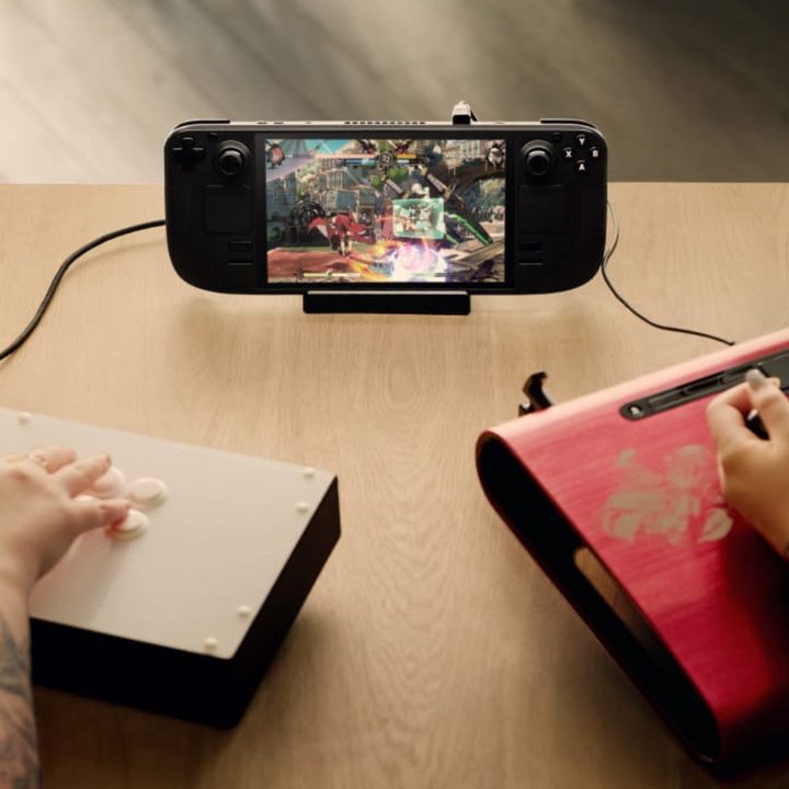 The Steam Deck connected to controllers.
