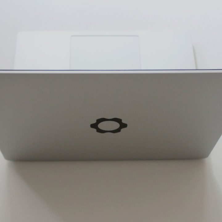 The Framework Laptop from the back, showing the logo on the lid.