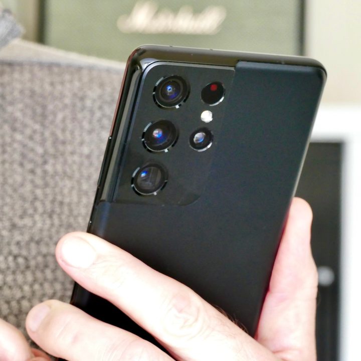 The Galaxy S21 Ultra from the back, held in a hand.