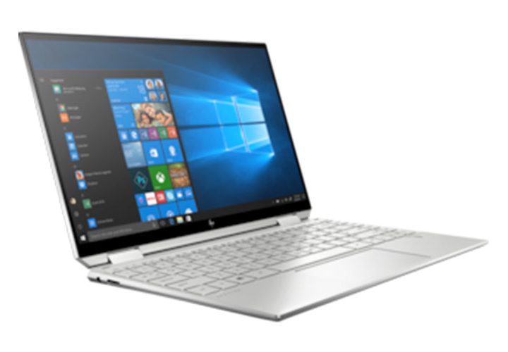An HP laptop with the screen open.