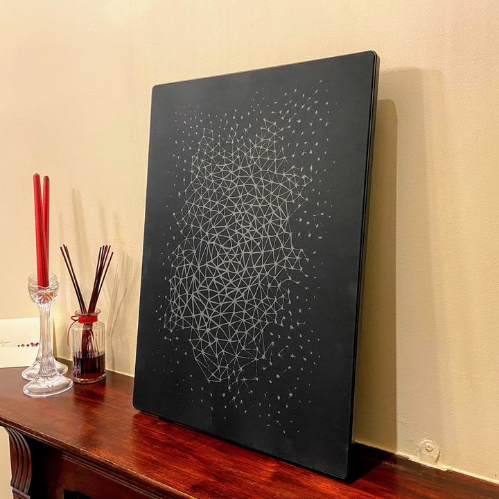 Ikea Symfonisk Picture Frame Speaker leaning against a wall.