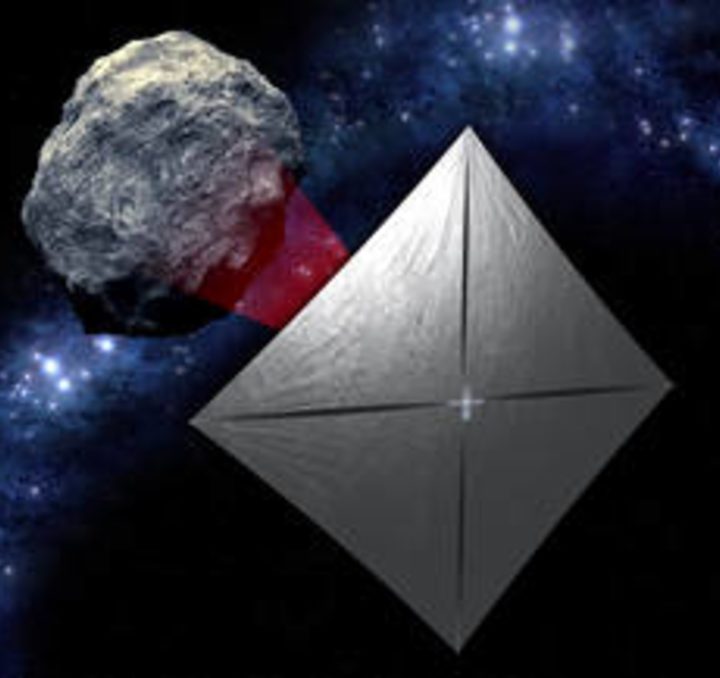 NEA Scout with the solar sail deployed as it flies by its asteroid destination.
