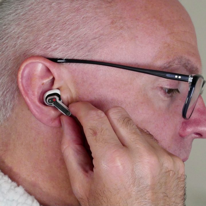 The Nothing Ear 1 placed in an ear.