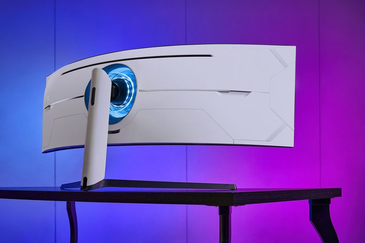 Back view of Samsung's new QLED Odyssey gaming monitor sitting on desk.