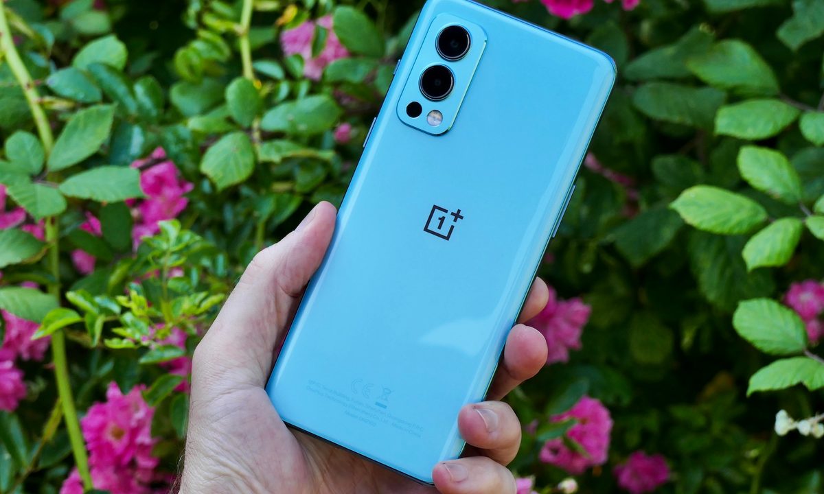 OnePlus Nord 2 from the back, held in hand.