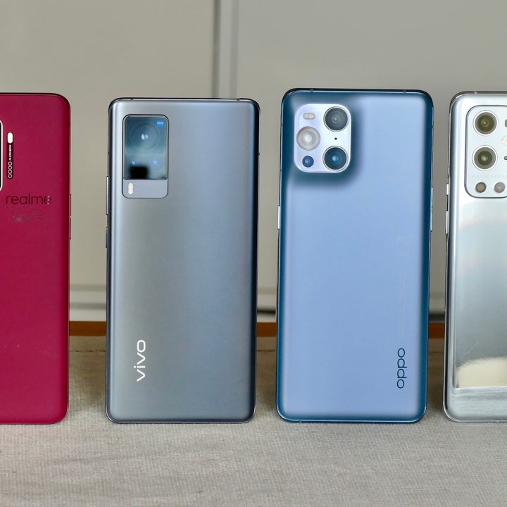 The backs of the OnePlus 9 Pro, Vivo X60 Pro, Oppo Find X3 Pro, and Realme X2 Pro Master Edition.