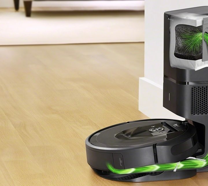 The Roomba i7+ emptying its contents.