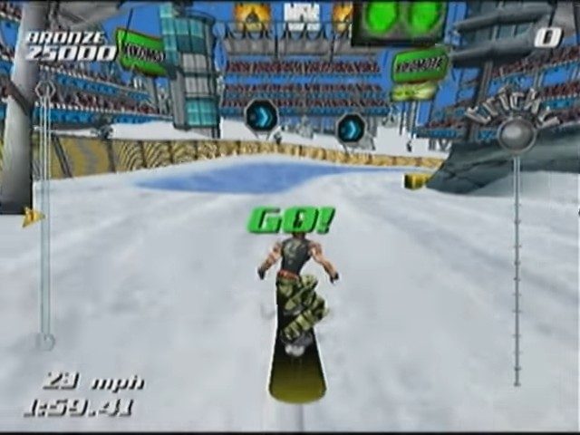 A snowboarder starting a race.