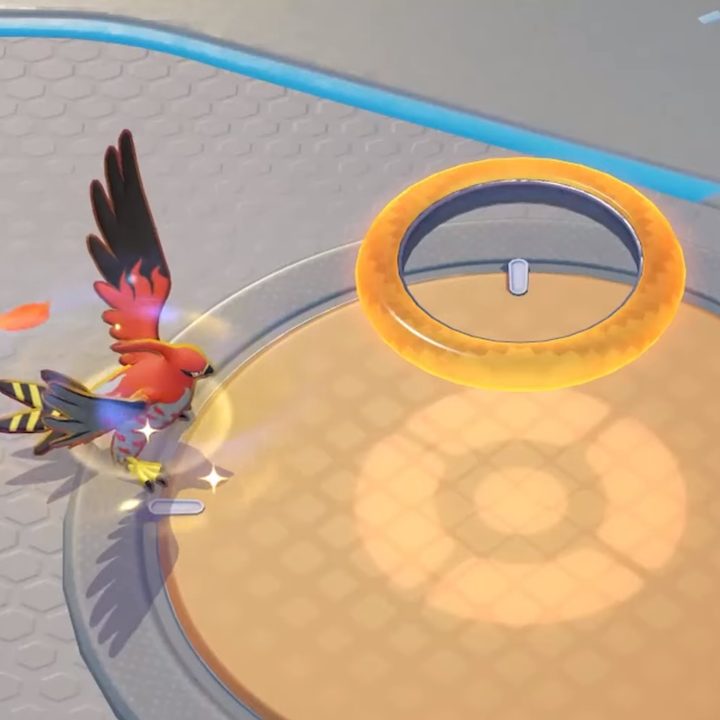 Talonflame scoring points in Pokémon Unite.