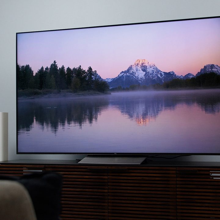 Mountain landscape imagery on the TCL 6-Series model R648 screen.