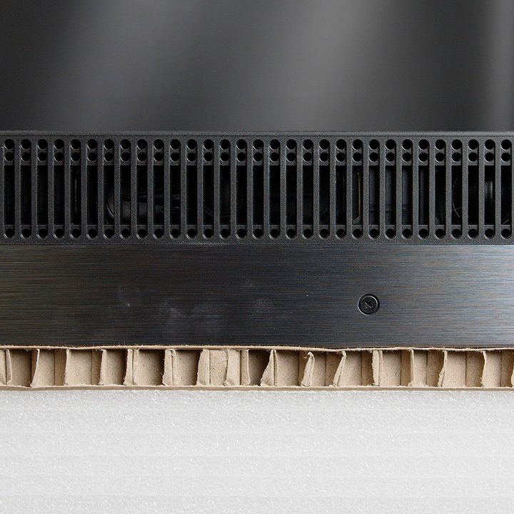 Plastic grill grates lining the underside of the TV.
