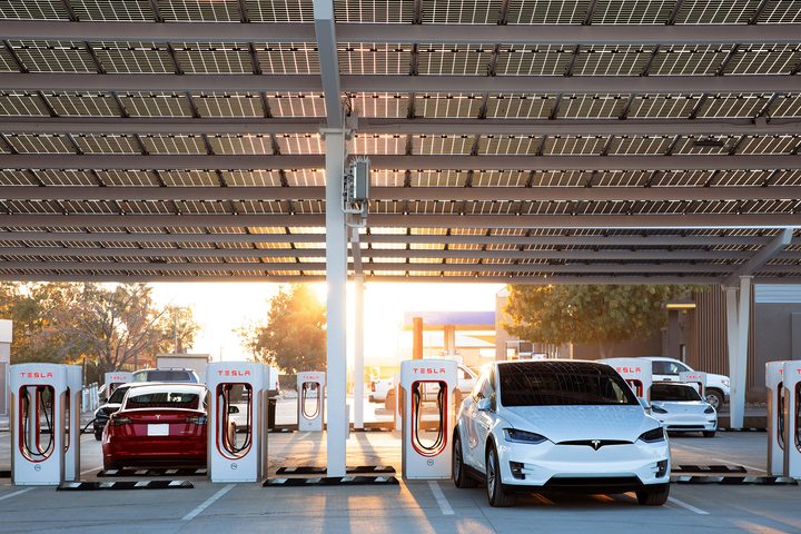 Teslas parked using the Tesla Superchargers.