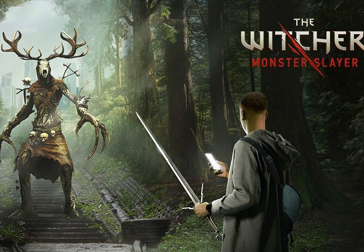 A Witcher Monster Slayer player holds a silver sword and smartphone.