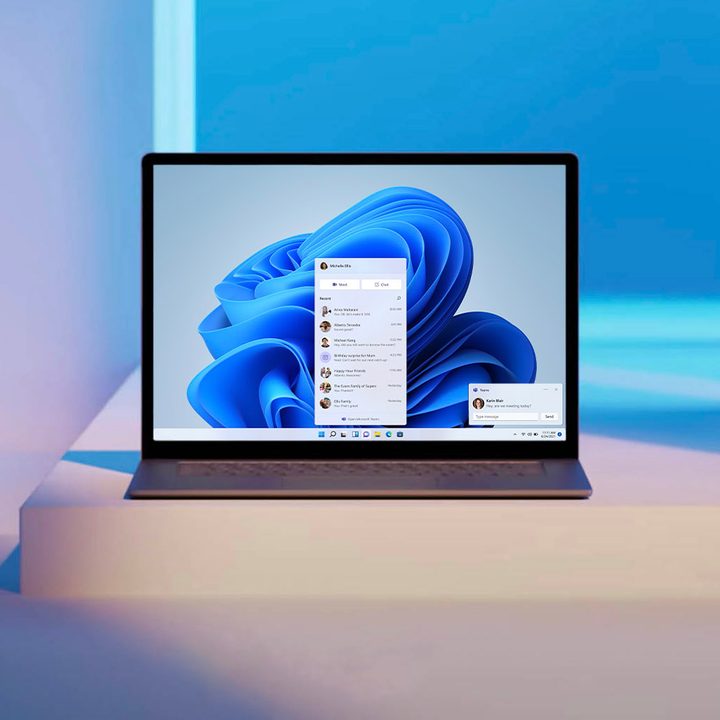 Laptop sitting on a desk showing Windows 11's built-in Microsoft Teams experience