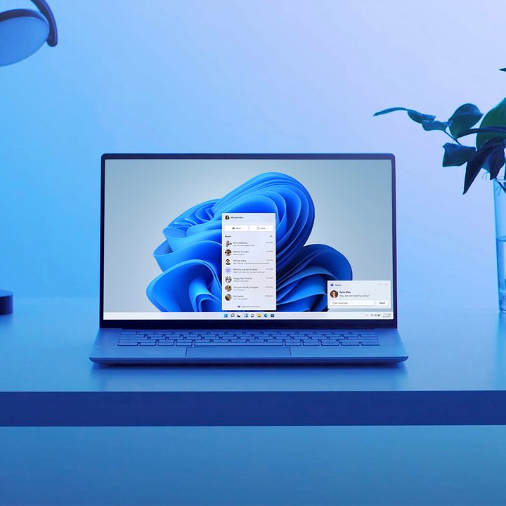 Laptop sitting on a desk showing Windows 11's built-in Microsoft Teams experience