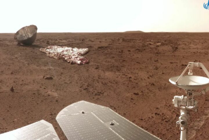China's Zhurong rover visits its parachute and backshell.