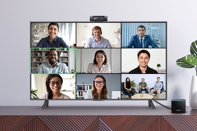 Photo of people on a Zoom call using a Fire TV Cube.