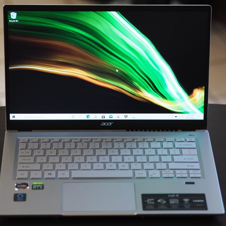 Acer Swift X sitting on a desk.