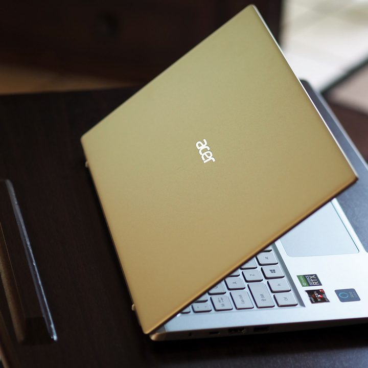 The Acer Swift X sitting on a desk.