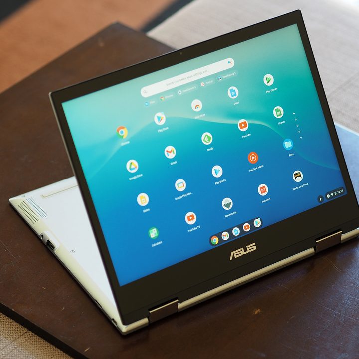 Asus Chromebook Flip CM3 folded backward, sitting on tabletop.