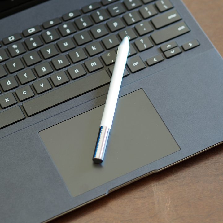 Stylus sitting on top of the Asus Chromebook Flip CM3 keyboard.
