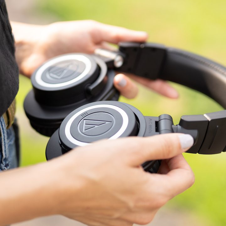 Audio Technica ATH M50xBT2 held in hand.