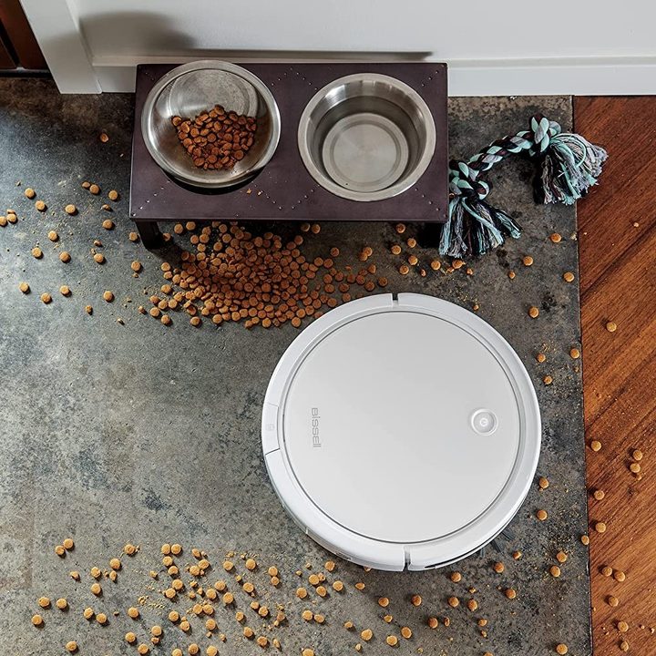 The Bissell SpinWave cleaning spilled pet food.
