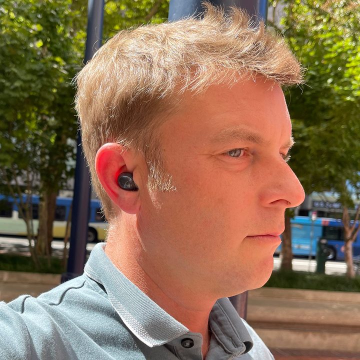 Closeup view of Caleb Denison wearing the Samsung Galaxy Buds 2.