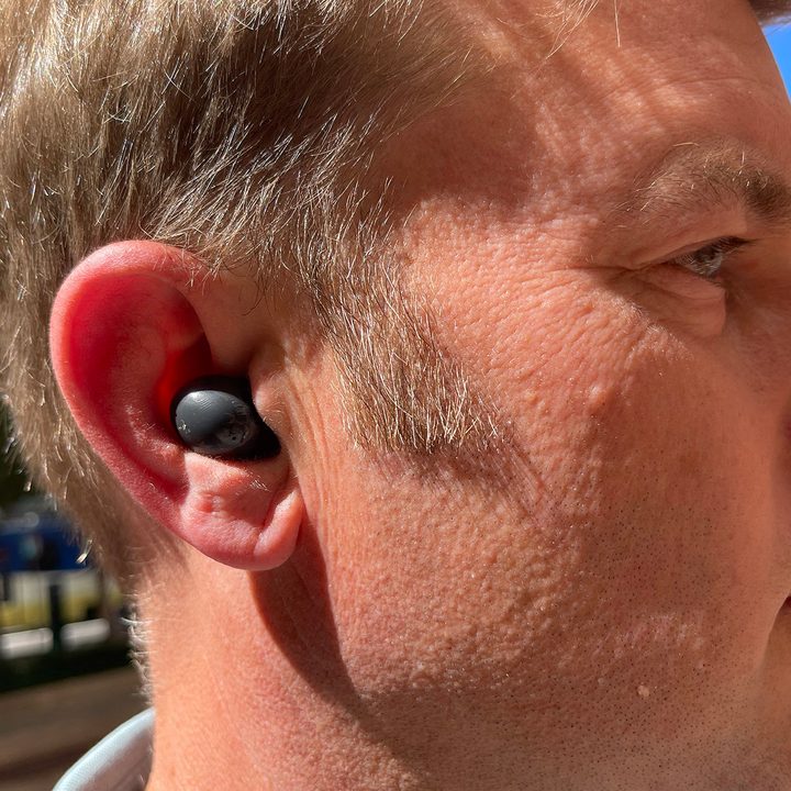Closeup view of Caleb Denison wearing the Samsung Galaxy Buds 2.