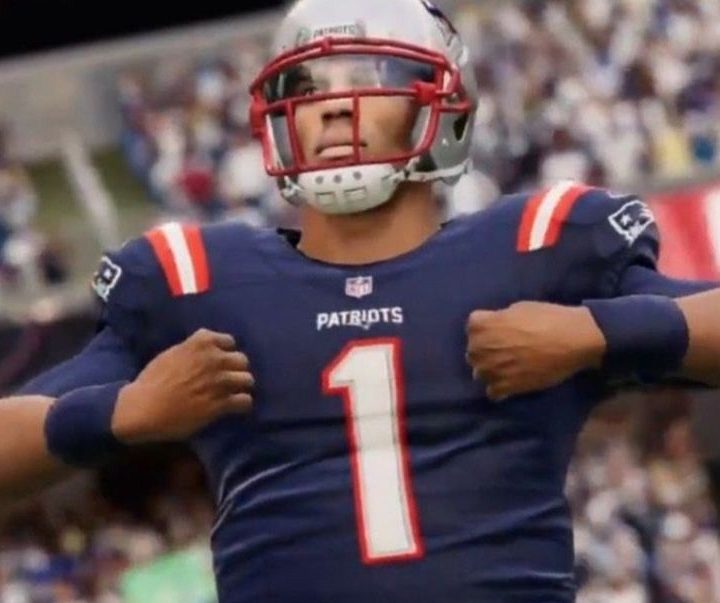 Cam Newton doing the superman in Madden.