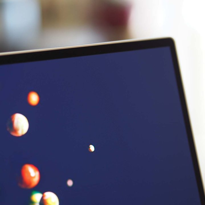 Close up on the Dell XPS 15 OLED's bezels and screen.