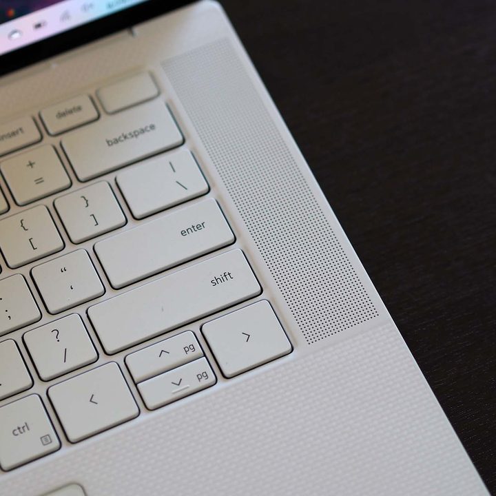 Closeup on the Dell XPS 15 OLED laptop's right size speaker.
