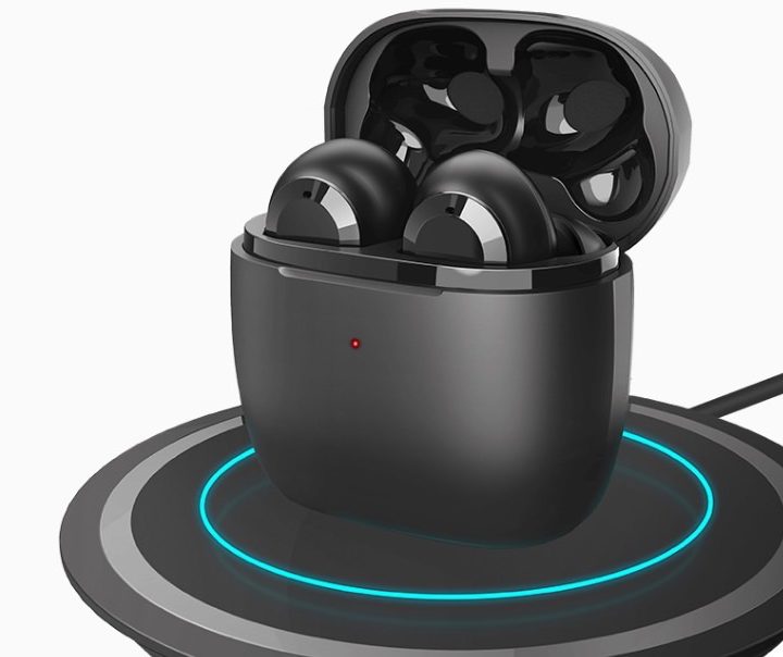 Earfun Air true wireless earbuds charging wirelessly.