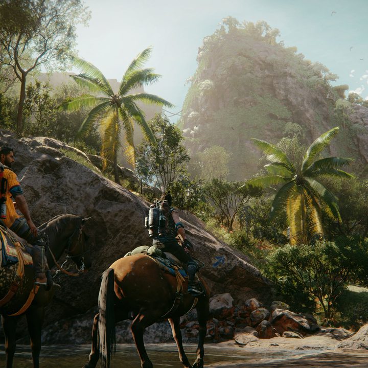 Two players ride horses in Far Cry 6.