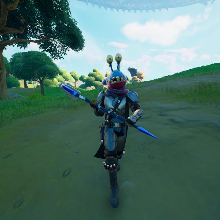 Alien parasite on the head of player in Fortnite.