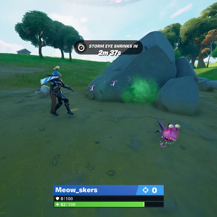 Alien parasite next to a player in Fortnite.
