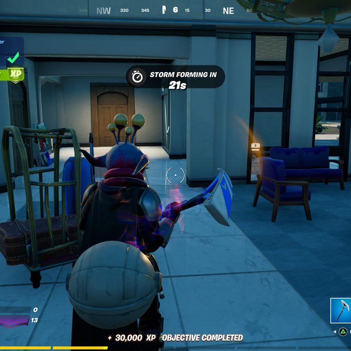 Alien parasite on the head of player in Fortnite.