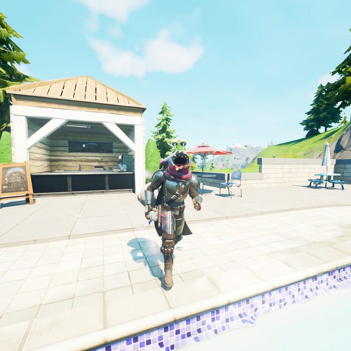 Alien parasite on the head of player in Fortnite.
