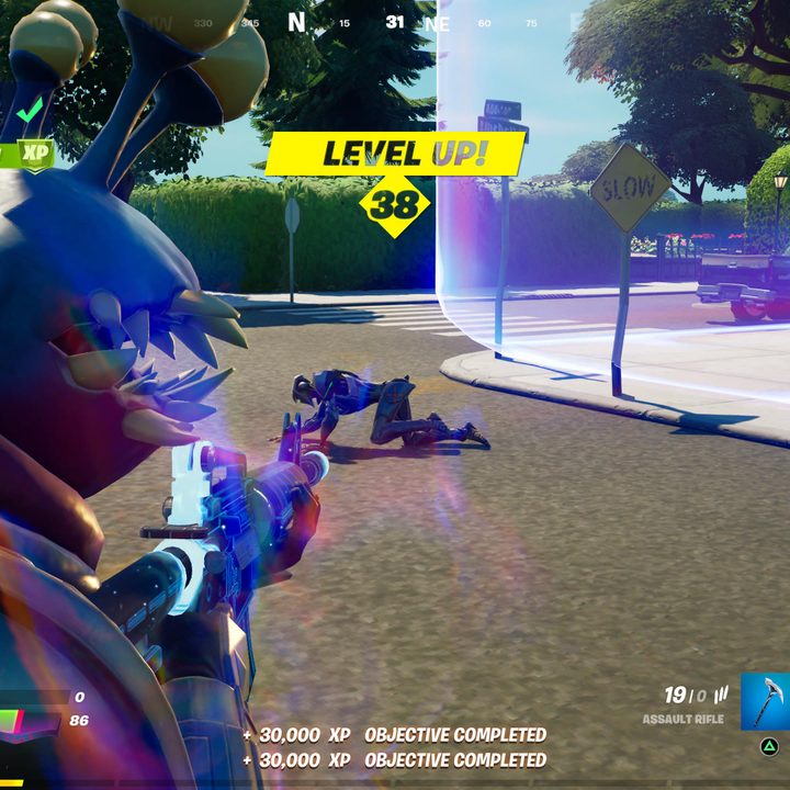 Shooting at NPC with alien parasite on head in Fortnite.