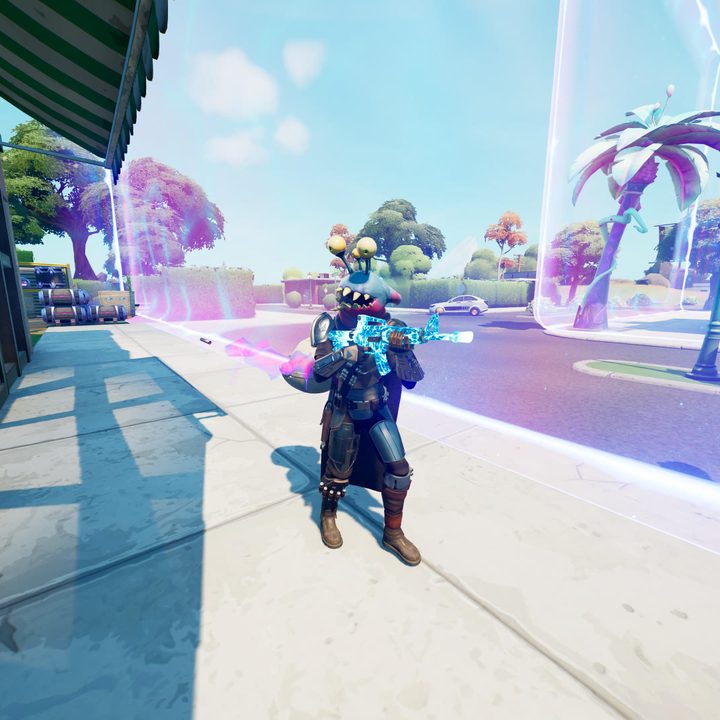 Shooting at NPC with alien parasite on head in Fortnite.
