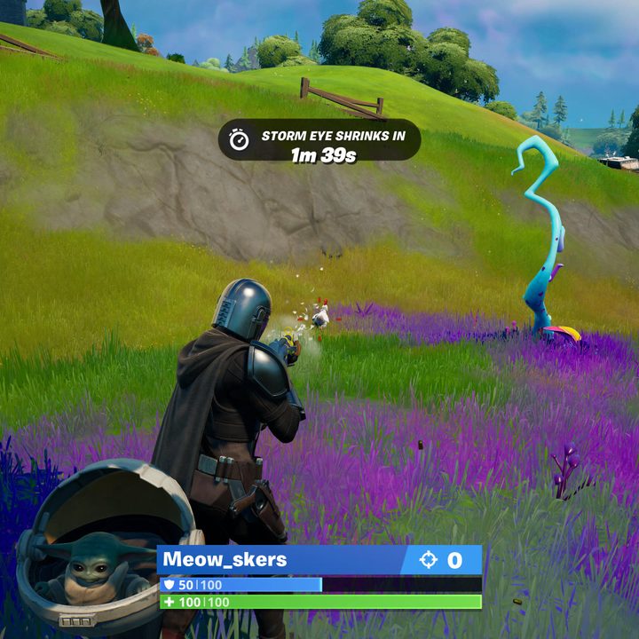 Hunting a chicken in Fortnite.