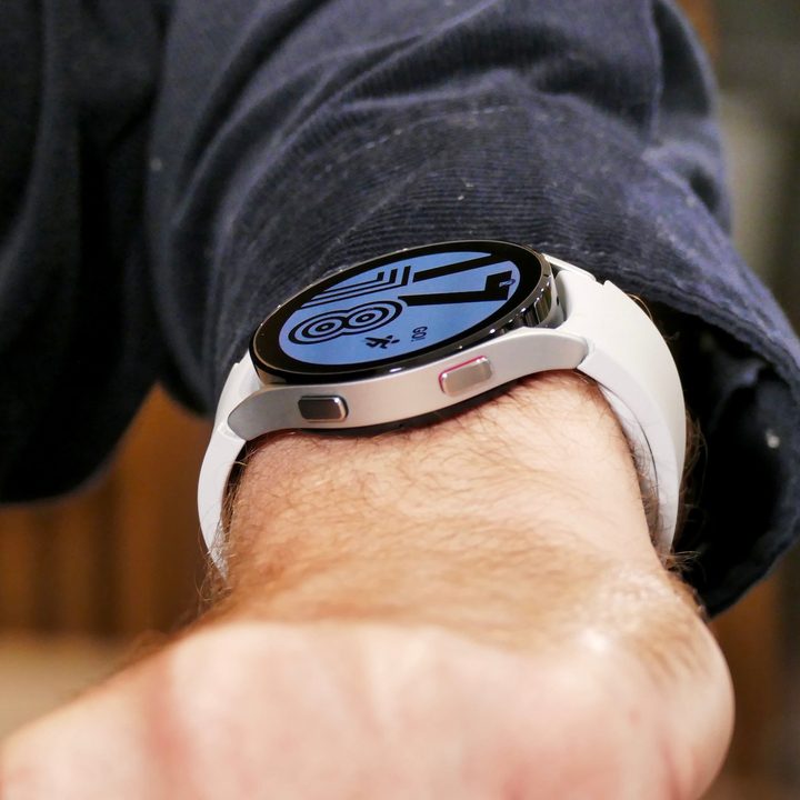 Galaxy Watch 4 on the wrist, showing side buttons.