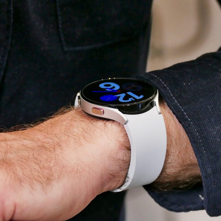 Galaxy Watch 4 in white on the wrist.