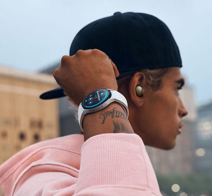 Man wearing Samsung Galaxy watch4 classic fitness.