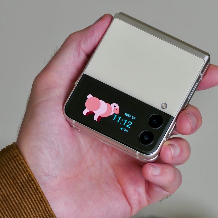 Closed Galaxy Z Flip 3 held in hand.