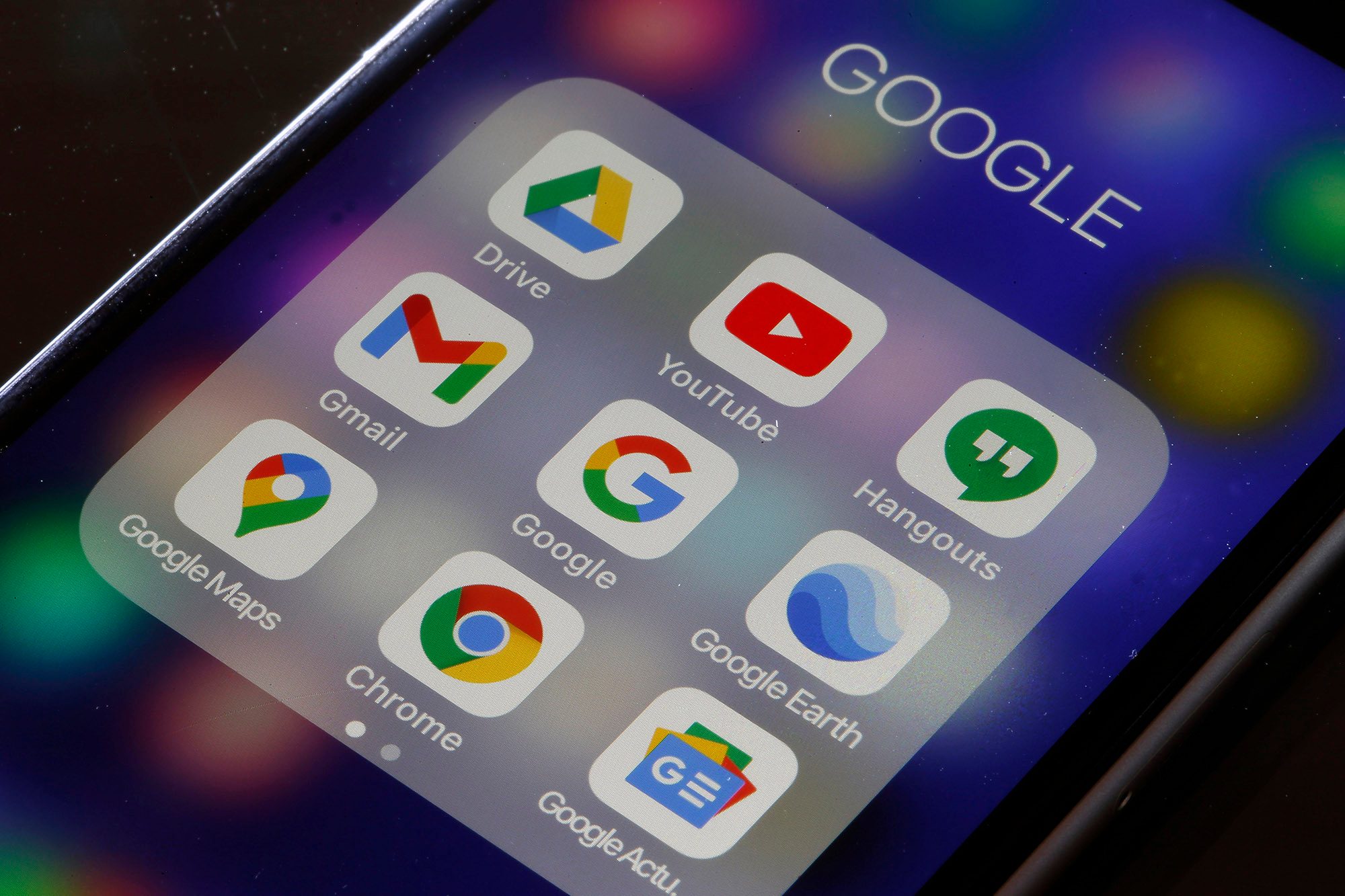 iPhone screen showing a folder with all of the Google apps.