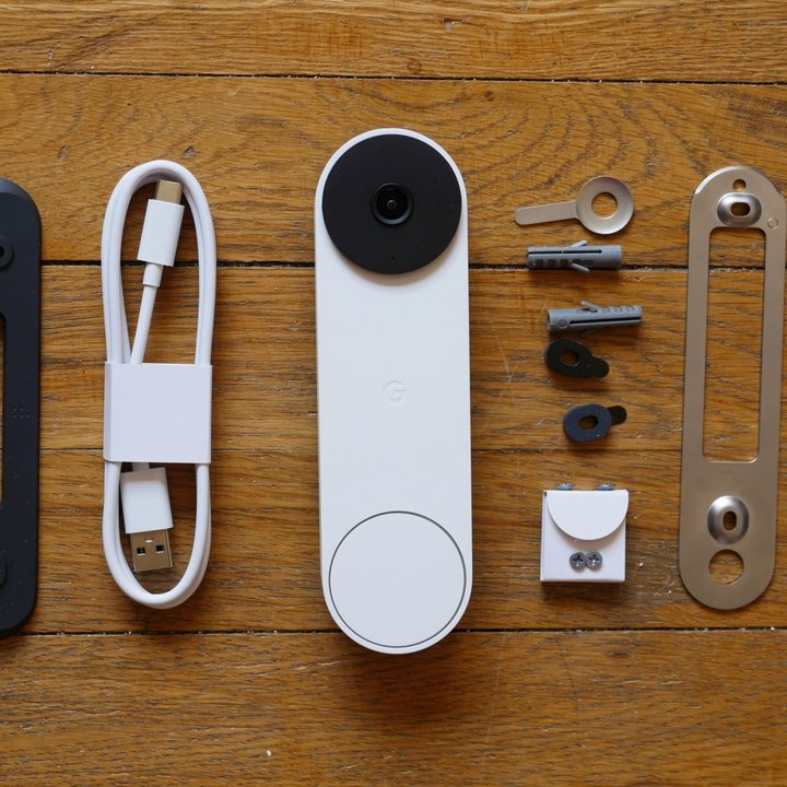 Google Nest Doorbell (battery) components laid out on floor.