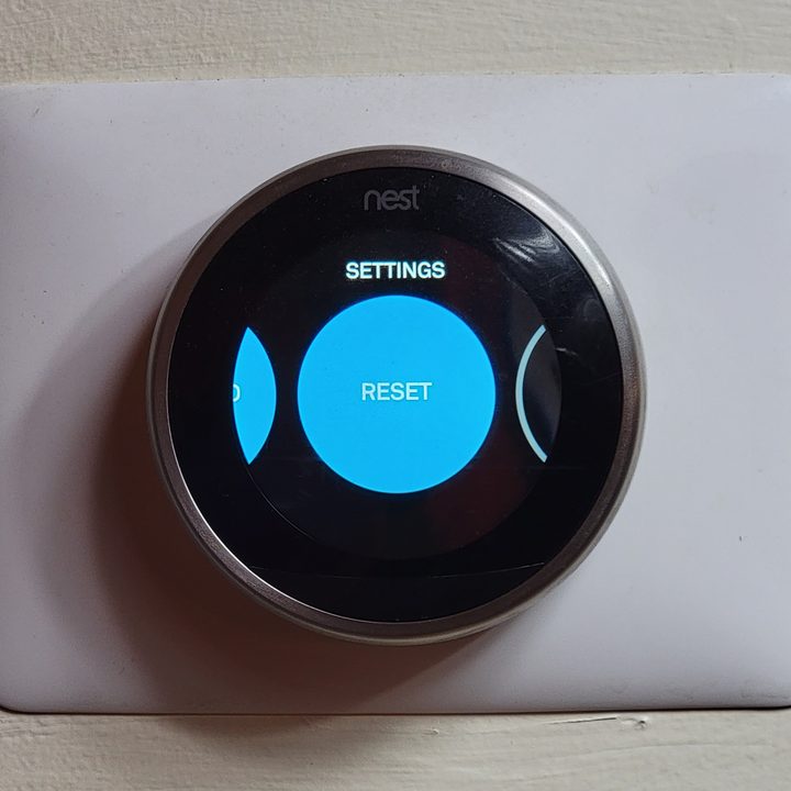 Settings menu showing option to reset Google Nest Thermostat.