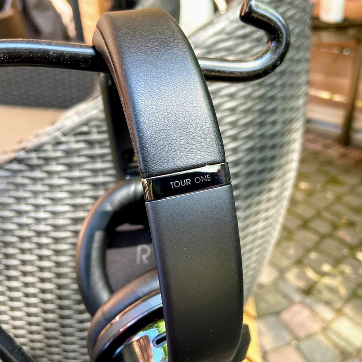 JBL Tour One wireless noise canceling headphones headband close-up.